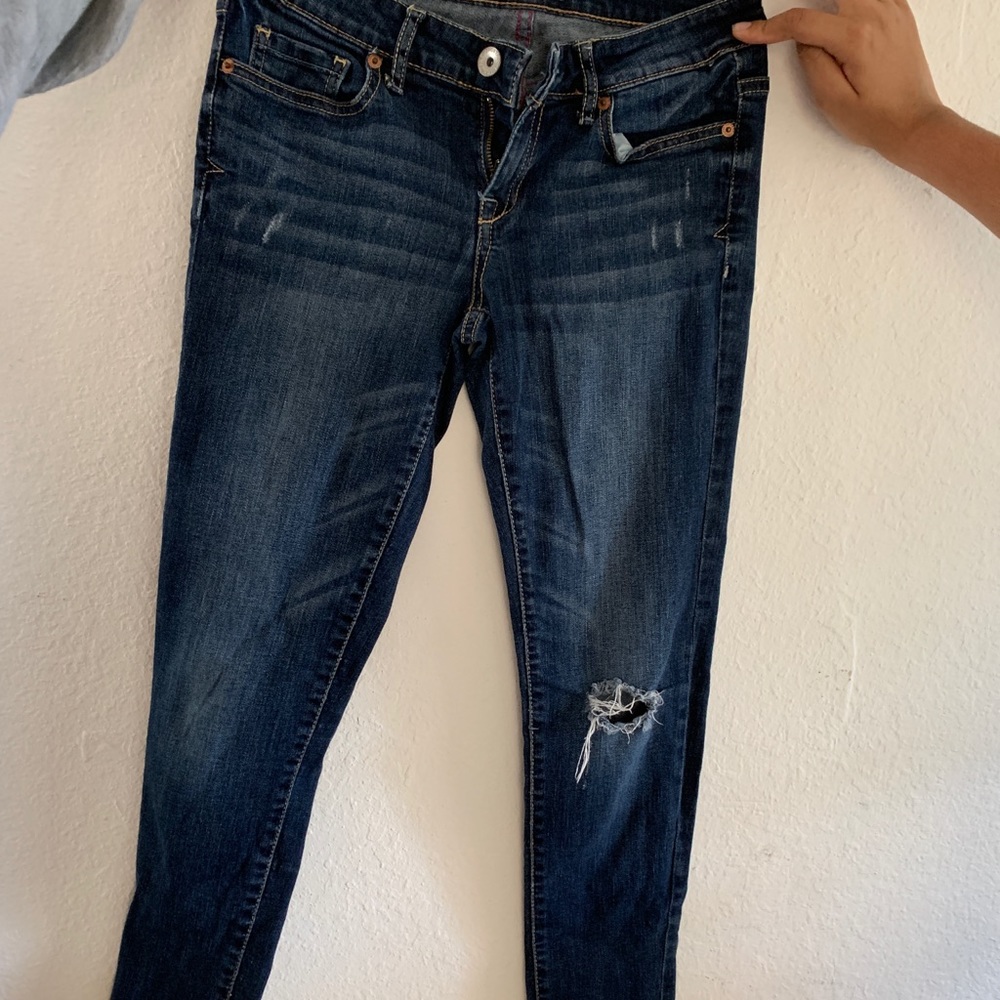 Skinny dark blue jeans